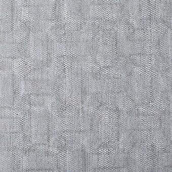 Gray metalasse fabric sample displaying a dense, woven grid pattern with raised squares and rectangular indentations; matte finish.